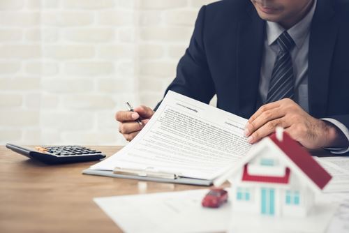 Real estate lawyer reviewing a contract